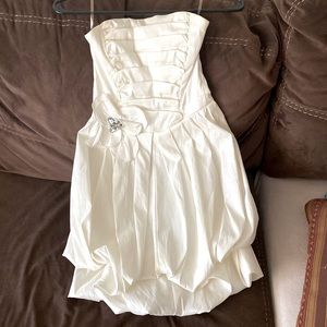 Wore once for graduation still has the tags practically new